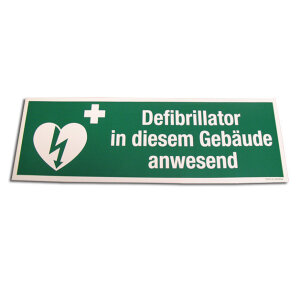 Kennzeichnung *Defibrillator in diesem Gebäude anwesend*